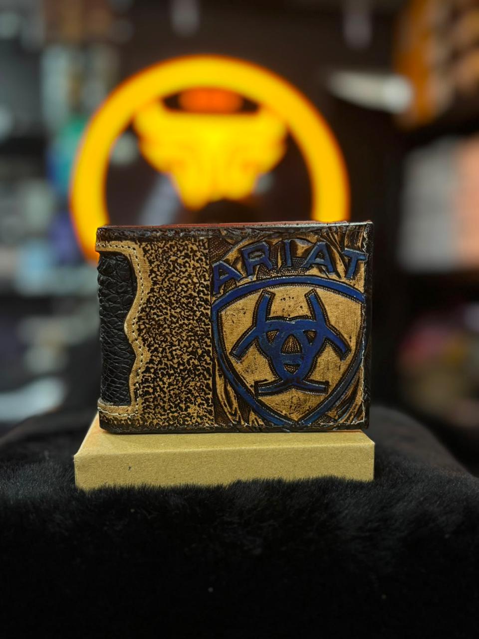 CARTERA CINCELADA